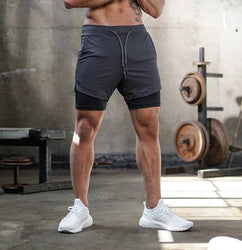 "2 in 1 Summer Athletic Shorts for Men - Featuring Phone Pockets and Dry Fit Technology for Ultimate Flexibility and Comfort during Workouts"